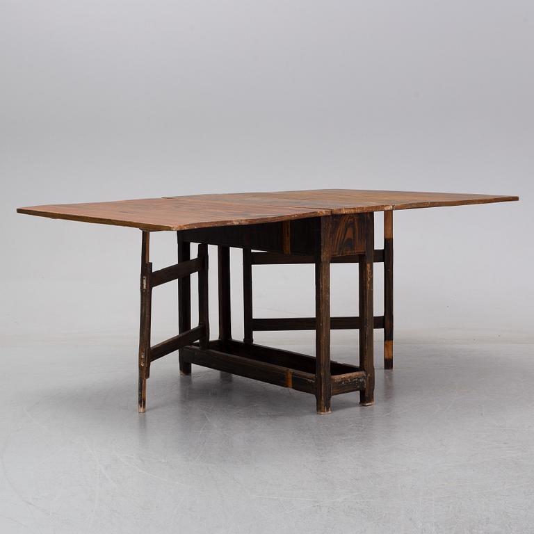 A 19th Century painted gate leg table.