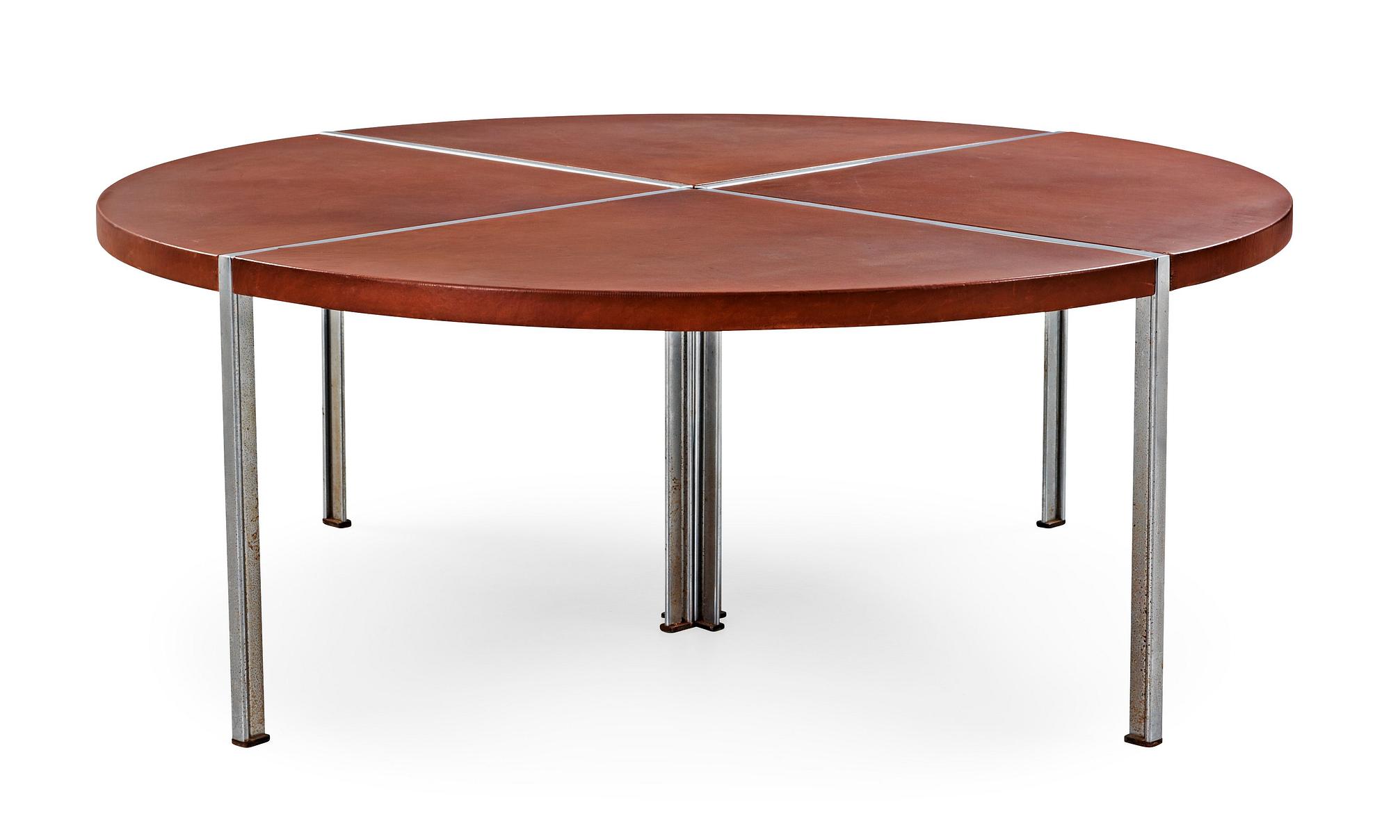 A Walter Knoll dining table with brown leather top, Germany.