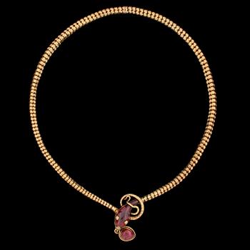 1234. A gold and garnet necklace, in the shape of a snake, 19th century.