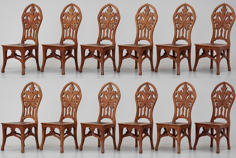 A Karl Tirén Art Noveau mahogany dining room set of furniture, comprising 15 pcs,by A.B Naeslunds Möbelfabrik.