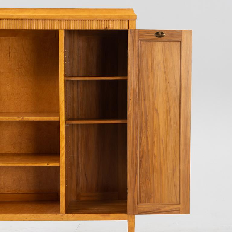 A birch bookcase with cabinet, AB C E Jonsson, Stockholm, 1910's/20's.