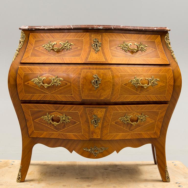 A Rococo-style chest of drawers, mid 20th century.