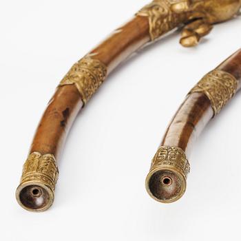 A pair of  Buddhist Ritual Tibetan ceremonial dragon horns/trumpets, 19th century.