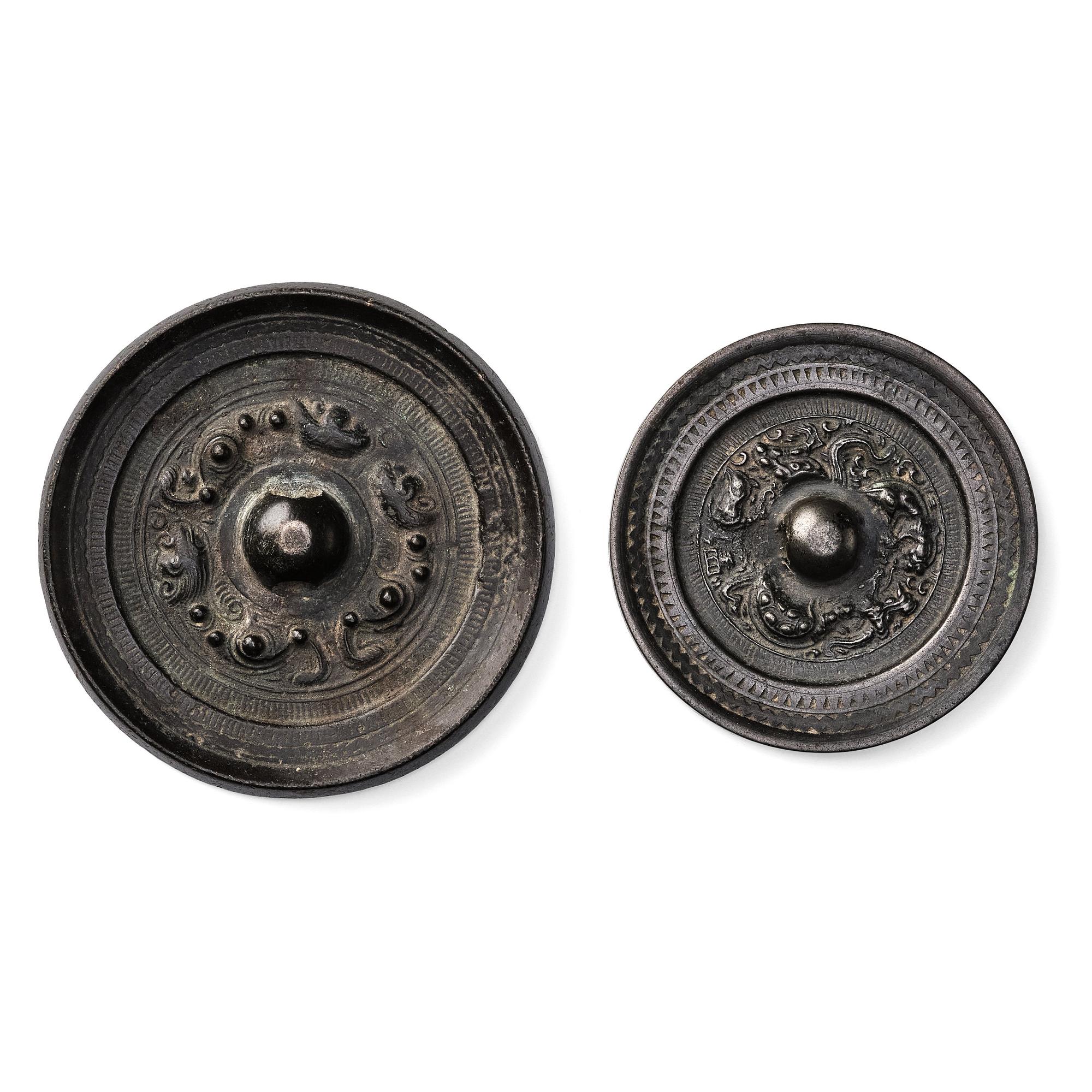 Two bronze mirrors, presumably Han dynasty (206 B.C.-220 A.D.).