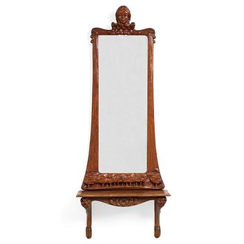 110. An Art Nouveau oak wall mirror with a console table.