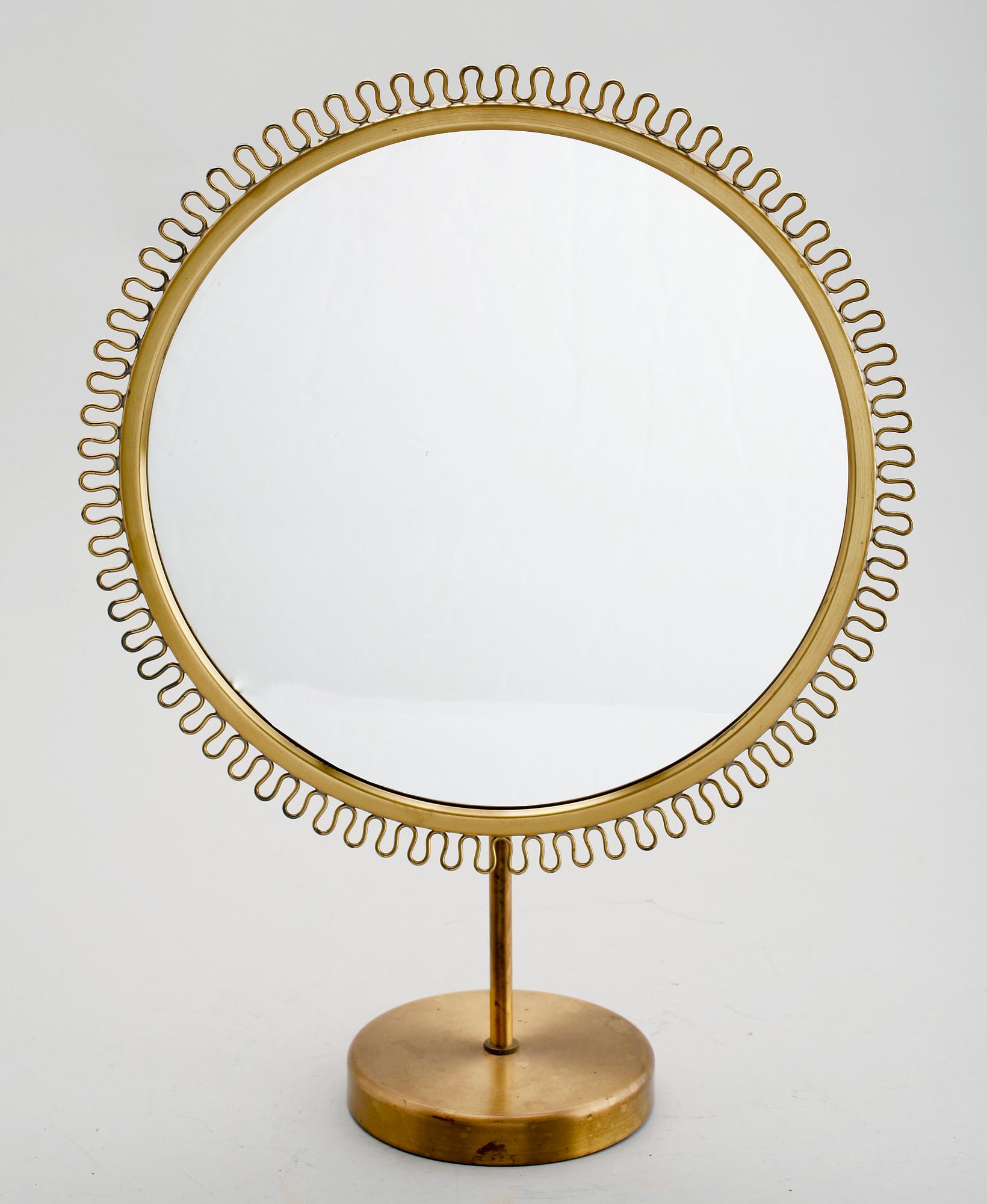 BORDSSPEGEL, mässing, möjligen NK (Nordiska Kompaniet).
OBS! TEXTÄNDRING.