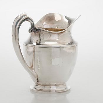 A sterling silver jug, Ellis Bros England.