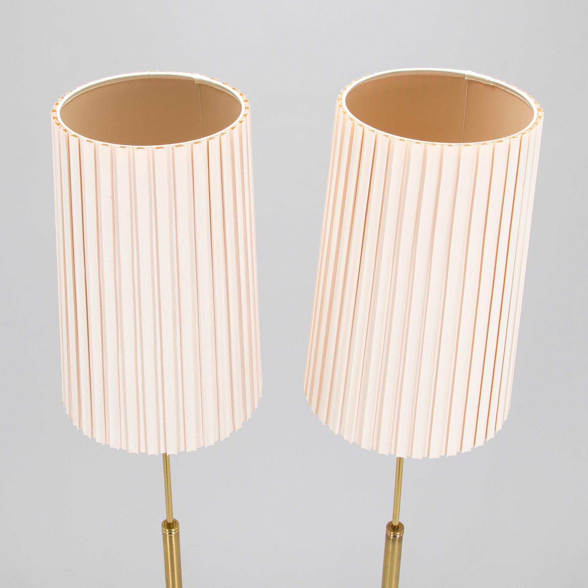 A pair of late 20th century floor lamps.