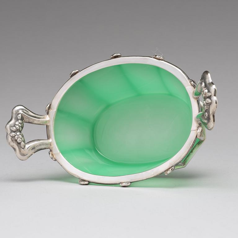 An Austrian mid 19th century silver and green glass bowl and cover on dish, un identified makers mark, Vienna 1845.