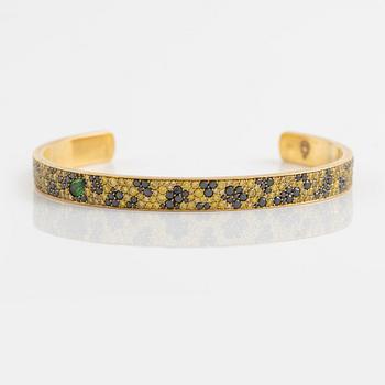 Crow's nest jewels, gold, black and yellow diamond and pear shaped tsavorite bangle.