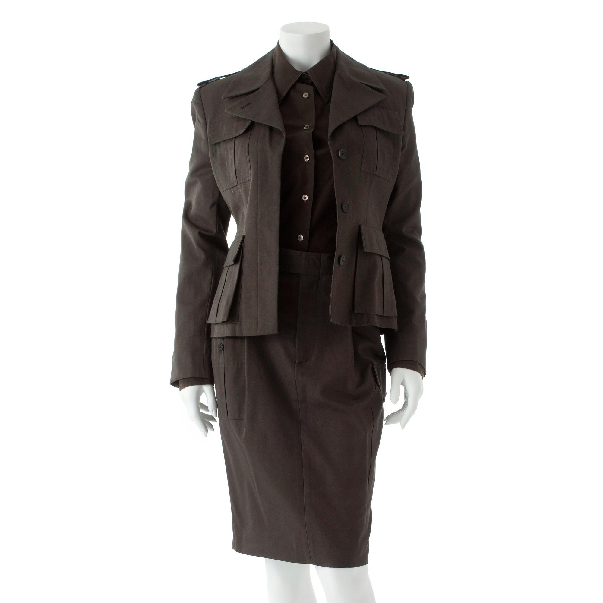 GUCCI, a three-piece suit consisting of jacket, shirt and skirt.