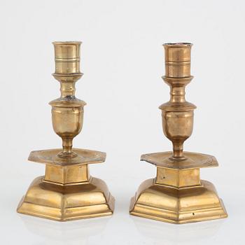 A pair of North-European Baroque brass candlesticks, circa 1700.