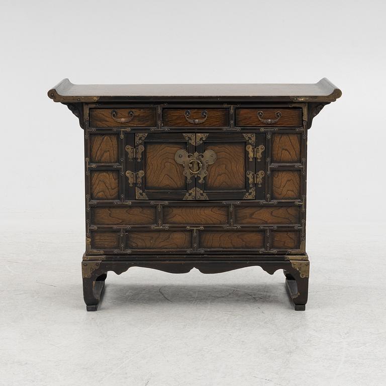 A Chinese hardwood cabinet, early 20th century.