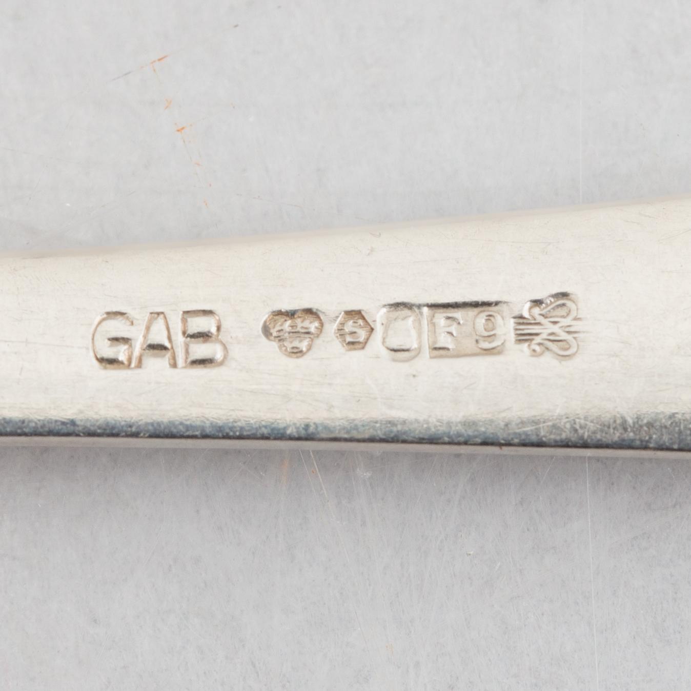 Jacob Ängman, 18 silver spoons, 'Rosenholm', GAB, Stockholm and Eskilstuna, 1943-91.