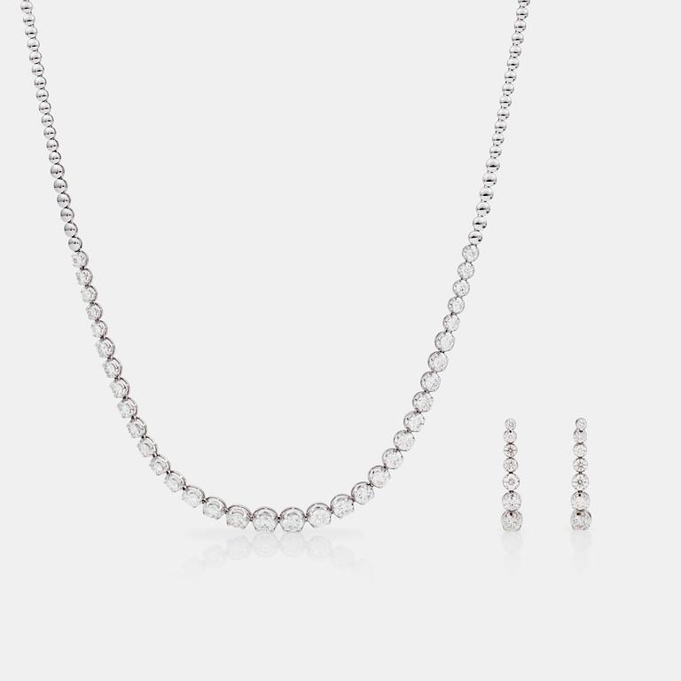 A line-necklace and matching earrings set with brilliant-cut diamonds.