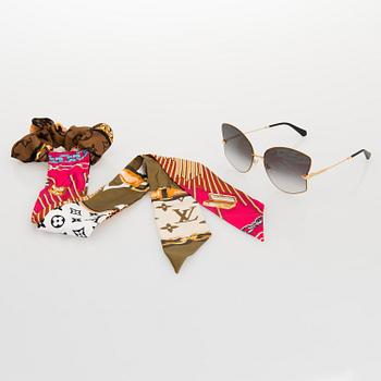 Louis Vuitton, 'Les Amants du pont neuf' sunglasses and a Chouchou scrunchie.