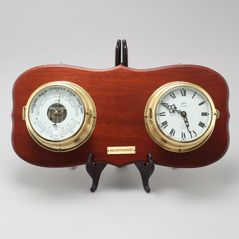 A wall clock and a barometer from Schatz.