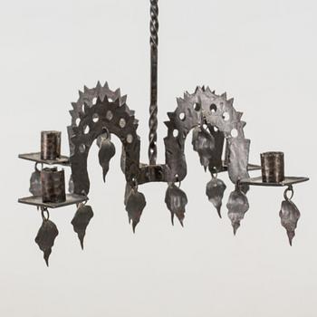 A FOLKLORE LAMP 20TH CENTURY.