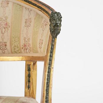 A pair of late Gustavian giltwood open-back armchairs, Stockholm, late 18th century.