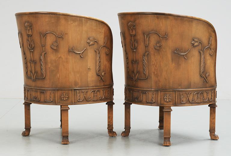 A pair of Axel Einar Hjorth stained birch armchairs 'Caesar' by NK 1928.