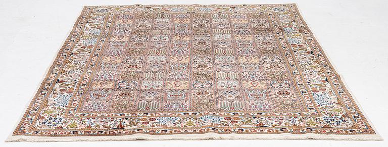A Moud carpet, part silk, approx. 285 x 195 cm.