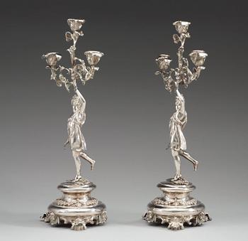 A pair of Swedish 19th century silver candelabra, makers mark of Gustaf Möllenborg, Stockholm 1864.