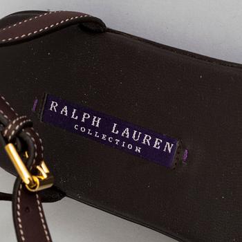 A pair of darkbrown leather sandals by Ralph Lauren.