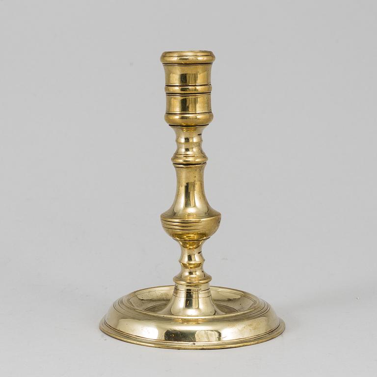 A bronze candlestick, 17th/18th century.