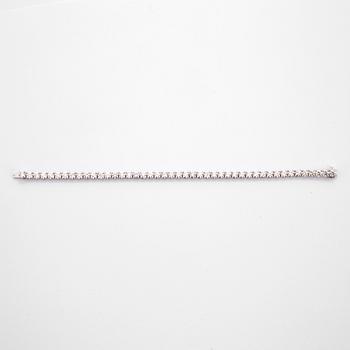 A line bracelet with 45 brilliant cut diamonds total carat weight ca 11.42 cts. Quality ca G-H/VS-SI.