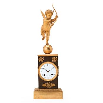 1290. A Swedish Empire gilt and patinated bronze mantel clock by J F Cedergren, clockmaker in Stockholm 1811-1839.