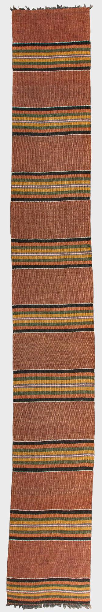 A 1930/1940s rag rug /runner. Circa 550 x 74 cm.