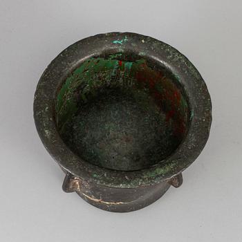 A 15th century bronze mortar.