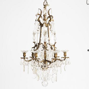 A six-branch rococ-style chandelier, first part 20th century.