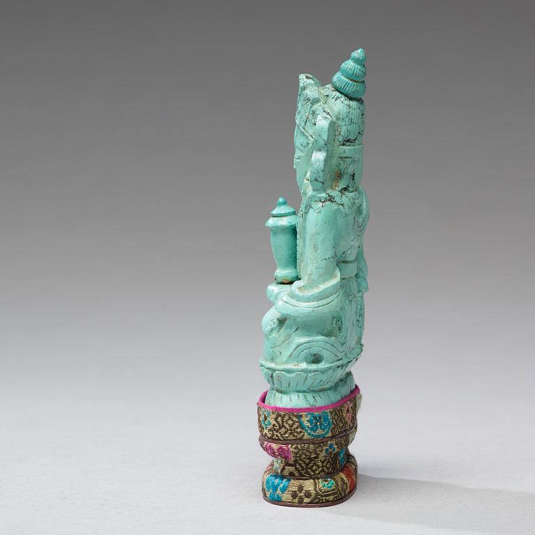 A turquoise figure of a bodhisattva, Tibet, late 19th Century.