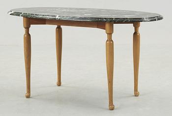 A Josef Frank marble and mahogany table, Svenskt Tenn.