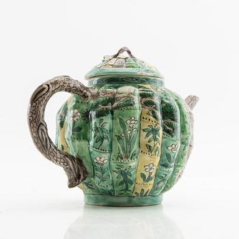 A set of three differently decorated tea pots with covers, Qing dynasty, 18century and 20th century.