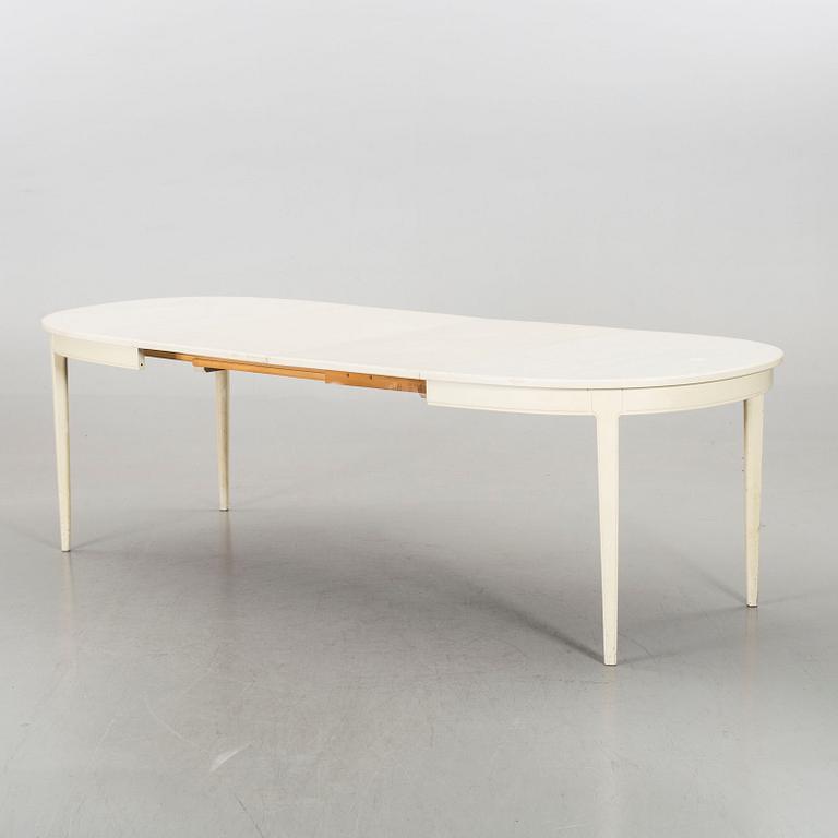 A dining group of 7 pieces by Carl Malmsten for Bodafors from the second half of the 20th century.