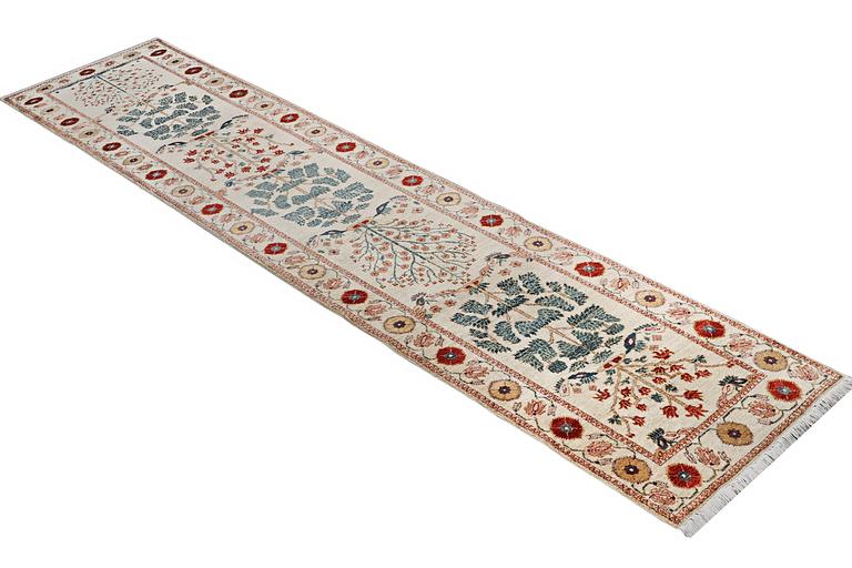 A runner carpet, Ziegler Design, ca. 433 x 85 cm.