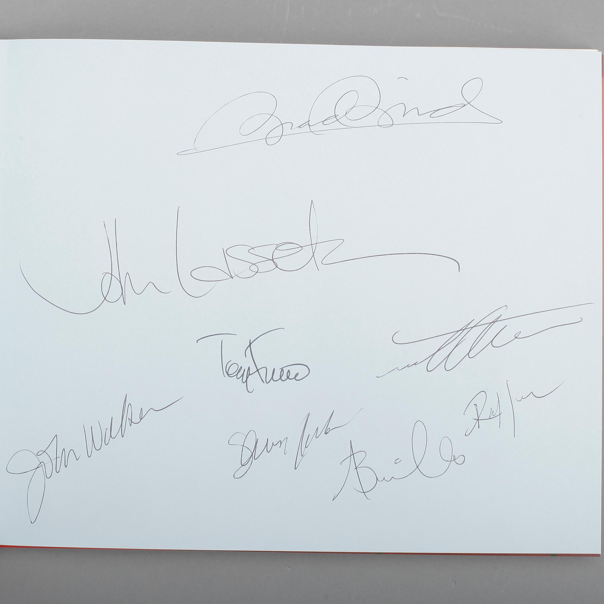 FILMBÖCKER MED AUTOGRAFER, 3 st, bla sign av Roy Disney och Brad Bird.