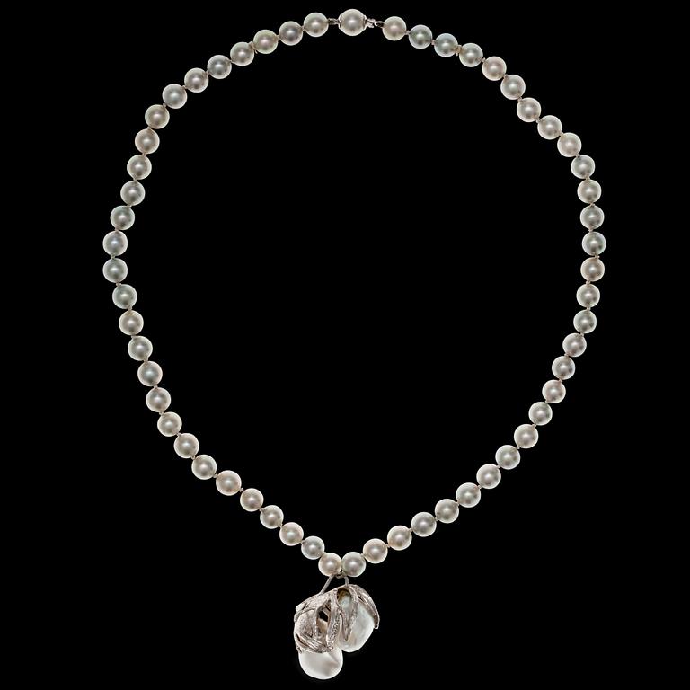 A NECKLACE, 18K white gold, akoya pearls 7 mm and 2 large baroque south sea pearls.