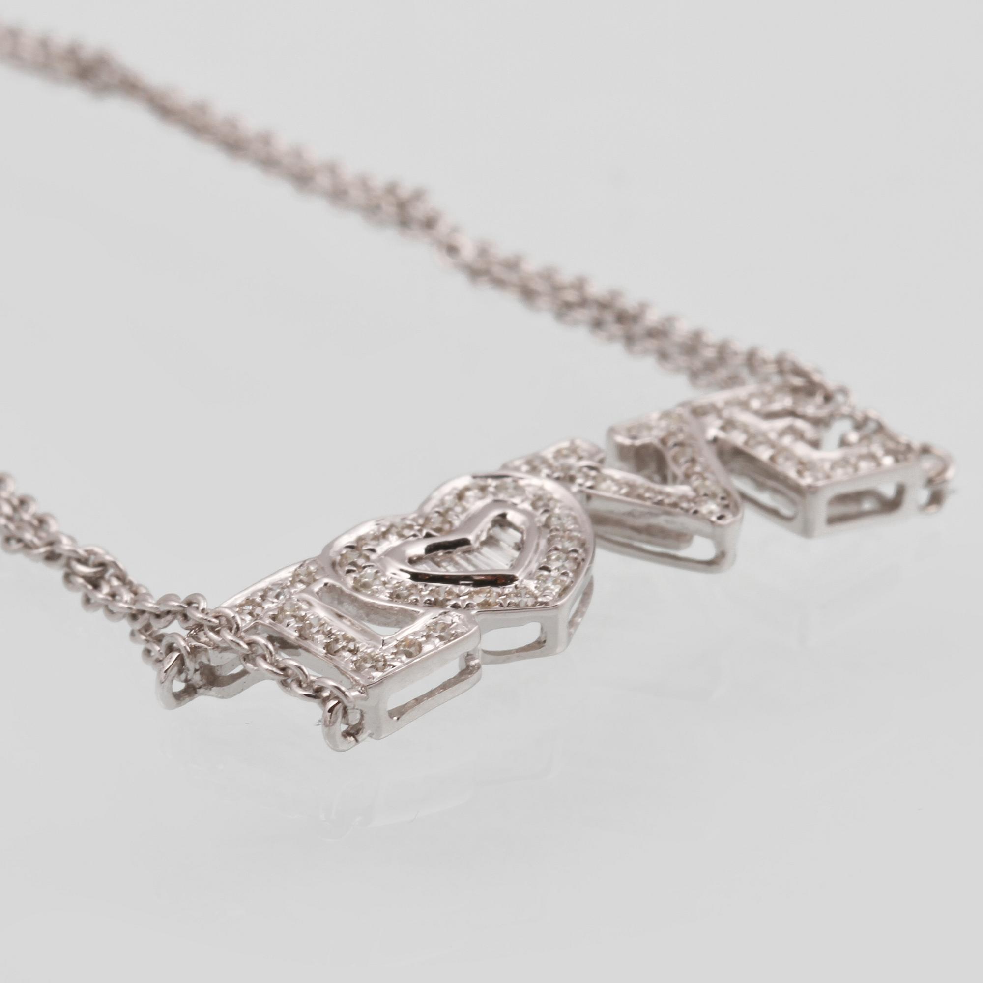 ARMBAND, 18K vitguld med briljant och baguettslipade diamanter ca 0.19 ct. Vikt 2,9 gram.