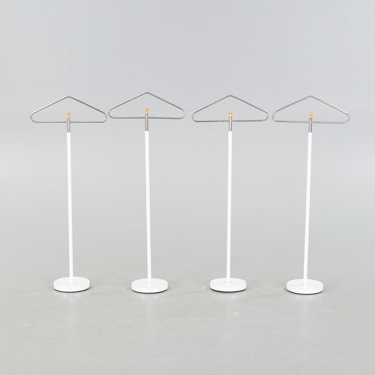 Four late 20th cenutry coat hangers.