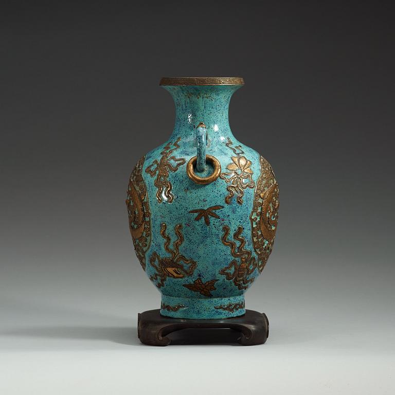 A gold relief against robins egg glazed vase, China, presumably Republich, 20th Century, with Qianlong sealmark.