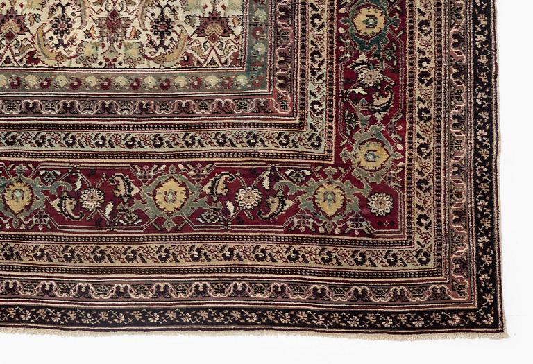 An antique Agra carpet, north India c. 430 x 392 cm.