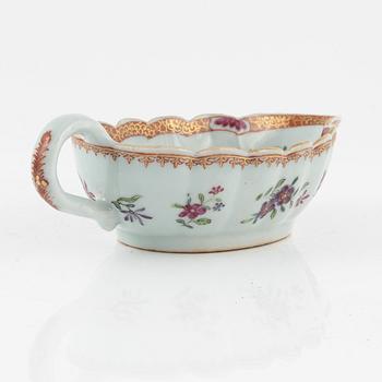 A famille rose dish, sauce boat and bowl, Qing dynasty, 18th Century.