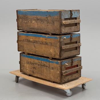 Three mid 1900s wooden boxes.