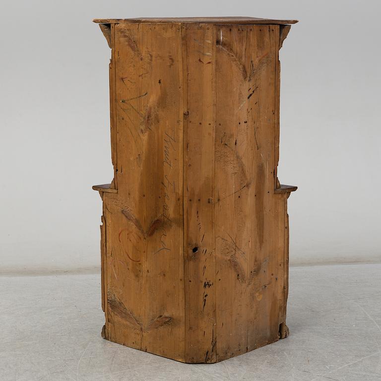 A Swedish corner cabinet dated 1784.