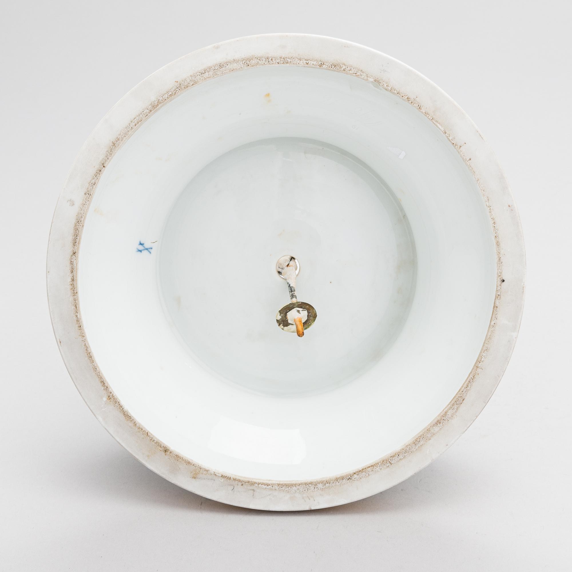 A Meissen Cupid porcelaine figure, 20th century.