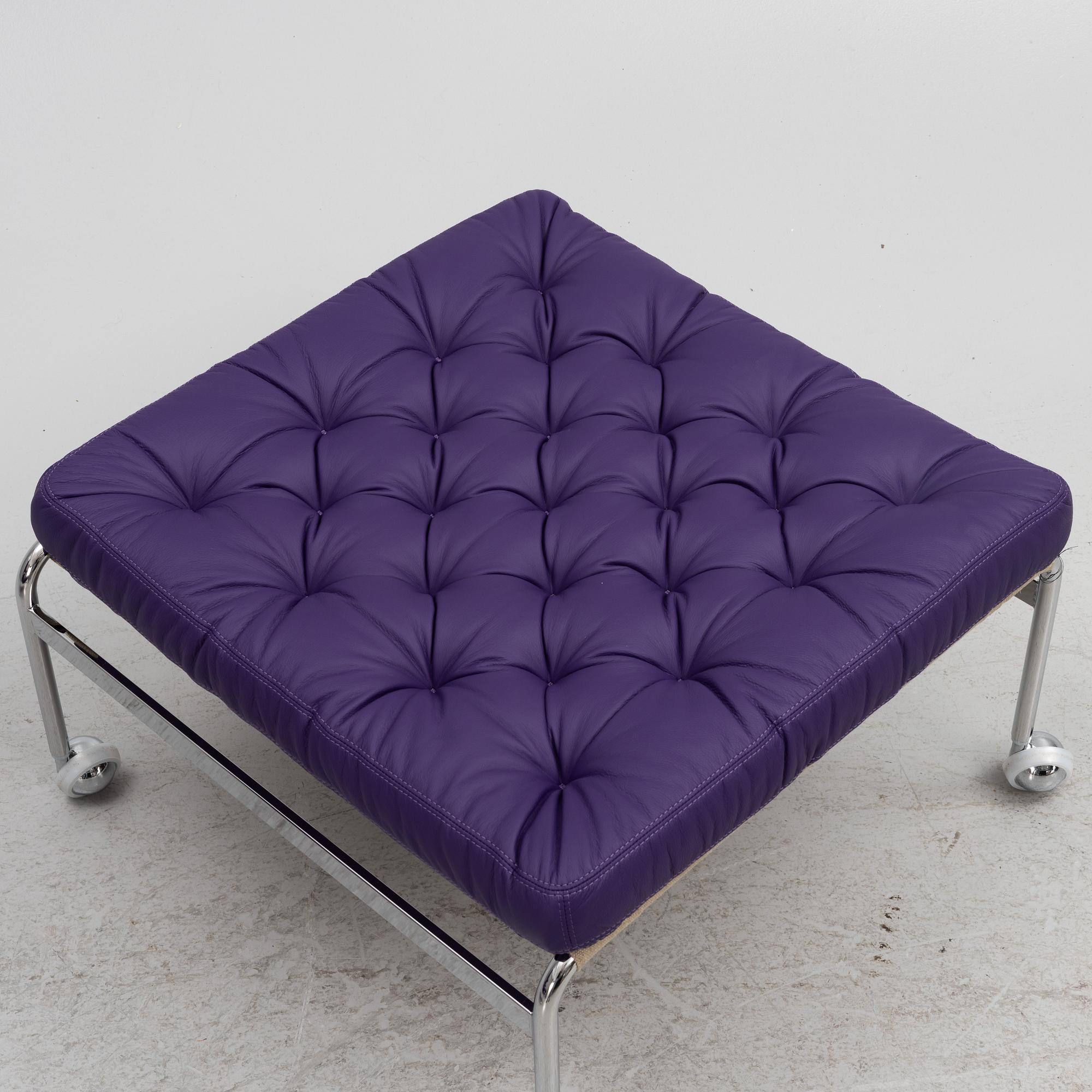 Bruno Mathsson, a limited edition of 'Karin 73' leather upholstered easy chair with footstool, from Dux, Released 2022.
