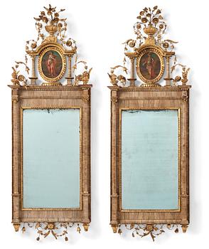 A pair of North-Italian Louis-XVI marble-mounted and carved giltwood mirrors, circa 1800.